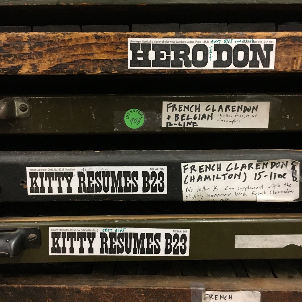 Wood type specimen tags on the outside of typecases at the Minnesota Center for Book Arts - Minneapolis, MN